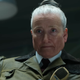Miss Trunchbull, wearing a fascist military uniform, seethes with rage.